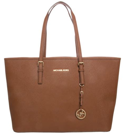 spot a fake michael kors jet tote bag|michael kors packable tote.